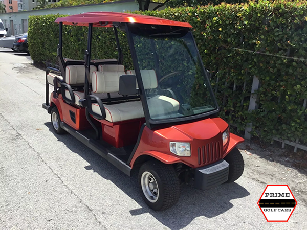 Red Tomberlin 6 Passenger Golf Cart